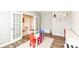 Another view of the playroom showcasing French doors and decor at 3650 Tipperlin Rd, Bargersville, IN 46106