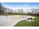 A splash pad for with colorful water features and benches at 3650 Tipperlin Rd, Bargersville, IN 46106