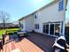 Back of home showing deck and yard at 3730 Cheyenne Ct, Columbus, IN 47203
