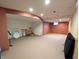 Spacious basement featuring carpet, ample room for activities, and potential for customization at 3730 Cheyenne Ct, Columbus, IN 47203