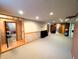 Spacious finished basement with recessed lighting, neutral carpet and stylish tiled accents at 3730 Cheyenne Ct, Columbus, IN 47203