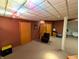 Finished basement with recessed lighting and comfortable seating area at 3730 Cheyenne Ct, Columbus, IN 47203