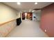 Partially finished basement with large open space and neutral carpet at 3730 Cheyenne Ct, Columbus, IN 47203