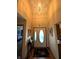 Inviting foyer with hardwood floors, coat closet and views of the living spaces at 3730 Cheyenne Ct, Columbus, IN 47203