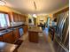 Spacious kitchen features stainless steel appliances, wood cabinets, and an island at 3730 Cheyenne Ct, Columbus, IN 47203
