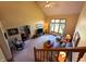 Spacious living room with vaulted ceilings, natural light, and comfortable seating at 3730 Cheyenne Ct, Columbus, IN 47203