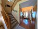 Carpeted staircase with wooden banister at 3730 Cheyenne Ct, Columbus, IN 47203