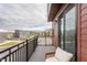 Cozy balcony with seating offers outdoor relaxation and scenic neighborhood views at 388 S Meridian Unit A-Bldg C St # A, Greenwood, IN 46142