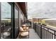 Relaxing balcony featuring seating with an excellent view of neighborhood amenities at 388 S Meridian Unit A-Bldg C St # A, Greenwood, IN 46142