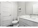Bright bathroom featuring a quartz countertop and gray shaker cabinets at 388 S Meridian Unit A-Bldg C St # A, Greenwood, IN 46142