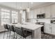 Modern kitchen with stainless steel appliances, white cabinetry, quartz countertop island, and pendant lighting at 388 S Meridian Unit A-Bldg C St # A, Greenwood, IN 46142