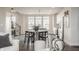 Open concept living room with dining area and kitchen featuring stainless steel appliances and lots of natural light at 388 S Meridian Unit A-Bldg C St # A, Greenwood, IN 46142