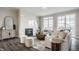 Elegantly designed living room with a marble fireplace, chic furnishings, and balcony access at 388 S Meridian Unit A-Bldg C St # A, Greenwood, IN 46142