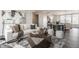 Open-concept living room featuring contemporary decor, an elegant staircase, and seamless access to the kitchen at 388 S Meridian Unit A-Bldg C St # A, Greenwood, IN 46142