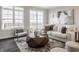 Modern living room with a large window, comfortable seating, and stylish decor at 388 S Meridian Unit A-Bldg C St # A, Greenwood, IN 46142