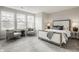 Bright main bedroom with sitting area, plush carpet, and views from three windows at 388 S Meridian Unit A-Bldg C St # A, Greenwood, IN 46142