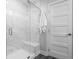 Modern shower featuring marble tiling and a glass door at 388 S Meridian Unit A-Bldg C St # A, Greenwood, IN 46142