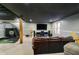 Finished basement with golf simulator, tv, sound system, and recessed lights at 3892 Arrowhead Ct, Greenfield, IN 46140
