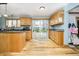 Kitchen with sliding glass door to the patio and pool at 3892 Arrowhead Ct, Greenfield, IN 46140