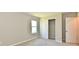 Bedroom featuring carpet, window, and closet at 4064 Waterfield Dr, Indianapolis, IN 46235