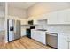 Modern kitchen featuring stainless steel appliances and white cabinets at 4064 Waterfield Dr, Indianapolis, IN 46235