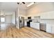 Kitchen with stainless steel appliances and modern white cabinetry at 4064 Waterfield Dr, Indianapolis, IN 46235
