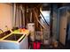 Basement laundry area with washer, dryer, water heater, and furnace for efficient home maintenance at 4107 Eisenhower Dr, Indianapolis, IN 46254