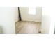 Bright bedroom featuring light hardwood floors, a large window, and white walls at 4107 Eisenhower Dr, Indianapolis, IN 46254