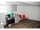 Basement kitchen featuring new appliances, gray cabinets, and adjacent seating at 4107 Eisenhower Dr, Indianapolis, IN 46254