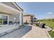 Inviting backyard patio with outdoor seating, a fire pit, and a covered porch at 4140 Omaha Dr, Bargersville, IN 46106