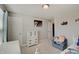 Bright bedroom featuring light gray walls, white furniture, and dinosaur themed decor at 4140 Omaha Dr, Bargersville, IN 46106
