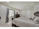 Well-lit bedroom featuring a wooden bed frame, white carpet, and gray window coverings at 4140 Omaha Dr, Bargersville, IN 46106