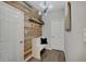 Stylish foyer features a wood-accent wall, coat hooks, a bench, and a modern light fixture at 4140 Omaha Dr, Bargersville, IN 46106