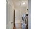 Efficient laundry room with modern washer and dryer, practical shelving, and a clean design at 4140 Omaha Dr, Bargersville, IN 46106