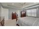 Spacious main bedroom featuring neutral paint, carpet, ceiling fan, and traditional-style furniture at 4140 Omaha Dr, Bargersville, IN 46106