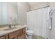 Traditional bathroom with cultured marble vanity, tile floor and a shower with curtain at 4280 Zachary Ln, Westfield, IN 46062