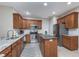 Modern kitchen boasts granite countertops, stainless steel appliances, and a functional island at 4280 Zachary Ln, Westfield, IN 46062
