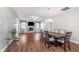 Spacious living and dining area with hardwood floors, a fireplace, and ample natural light at 4280 Zachary Ln, Westfield, IN 46062