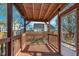 Screened-in wooden patio with views of the fenced backyard at 4280 Zachary Ln, Westfield, IN 46062