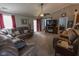 Inviting living room featuring plush seating, a ceiling fan, and a slider leading to outdoor space at 498 Lake Shore Ct, Franklin, IN 46131