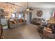 Spacious living room with vaulted ceilings, a ceiling fan, neutral tones, and lots of comfortable seating at 498 Lake Shore Ct, Franklin, IN 46131