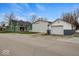 Shot of home with detached garage with matching paint and design scheme at 501 S John St, Arcadia, IN 46030