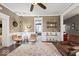 Cozy living room with hardwood floors, wainscoting, and stylish decor at 501 S John St, Arcadia, IN 46030
