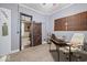 Home office with natural light, a ceiling fan, and a sliding barn door at 501 S John St, Arcadia, IN 46030