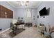 Home office with natural light, a ceiling fan, and a comfortable chair at 501 S John St, Arcadia, IN 46030