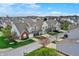 Scenic aerial view of townhomes featuring attached garages and well-maintained landscaping in a suburban community at 503 Fayette Dr, Westfield, IN 46074