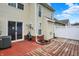 Backyard featuring a wooden patio and sliding glass doors to the home's interior at 503 Fayette Dr, Westfield, IN 46074