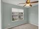 Well-lit bedroom featuring neutral paint and a ceiling fan for added comfort at 503 Fayette Dr, Westfield, IN 46074