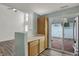 Bright kitchen featuring stainless steel appliances, wood cabinets, and slider to back patio at 503 Fayette Dr, Westfield, IN 46074