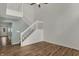 The living room features wood floors, a staircase, and views of the entrance at 503 Fayette Dr, Westfield, IN 46074